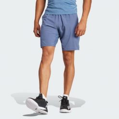Szorty Tennis Ergo. Niebieskie krótkie spodenki sportowe Adidas, s, bez wzorów, z elastanu. Za 233.15 zł.