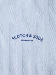 Scotch & Soda Koszulka polo w kolorze błękitnym rozmiar: L. Niebieskie koszulki polo Scotch & Soda, l, bez wzorów, prążkowane, bez kołnierzyka, bez ramiączek. Za 88.64 zł.