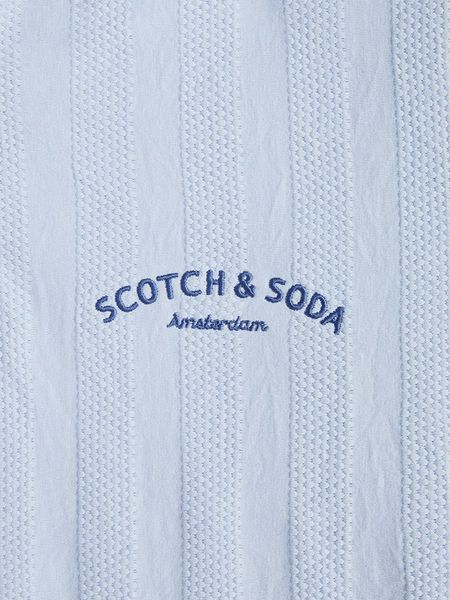 Scotch & Soda Koszulka polo w kolorze błękitnym rozmiar: L. Niebieskie koszulki polo Scotch & Soda, l, bez wzorów, prążkowane, bez kołnierzyka, bez ramiączek. Za 93.07 zł.
