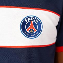 PSG polo męskie. Niebieskie koszulki polo PARIS SAINT GERMAIN, m, bez wzorów, bez kołnierzyka, bez ramiączek, do piłki nożnej. Za 214.99 zł.