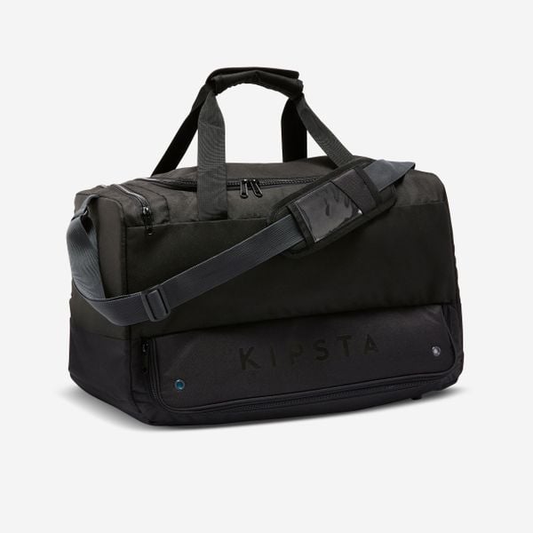 Second Life - Torba sportowa Kipsta Hardcase 45 L - Stan Doskonały. Czarne torby na ramię KIPSTA, bez wzorów, z materiału, na ramię, duże, bez dodatków. Za 75.99 zł.