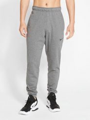 Nike Spodnie dresowe w kolorze szarym rozmiar: M. Szare spodnie treningowe długie Nike, m, bez wzorów, z dresówki. Za 172.49 zł.