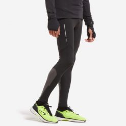 Legginsy do biegania męskie Kiprun Run 500 ocieplane. Czarne legginsy długie sportowe KIPRUN, m, bez wzorów, z elastanu, do biegania. Za 139.99 zł.