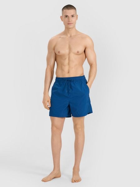 4F Spodenki plażowe boardshorty męskie - turkusowe L. Niebieskie szorty 4F, l, bez wzorów, z syntetyku, wakacyjne. Za 99.99 zł.