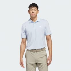 Koszulka polo Ultimate365 Solid. Niebieskie koszulki polo Adidas, m, bez wzorów, z materiału, bez kołnierzyka, bez ramiączek, na golfa. Za 259.00 zł.
