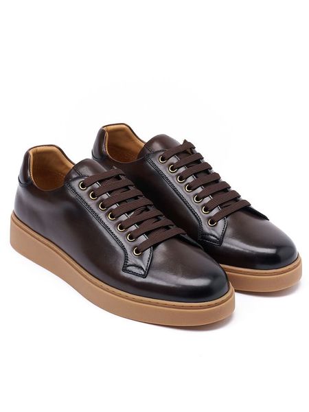 British Passport Skórzane sneakersy w kolorze brązowym rozmiar: 43. Brązowe buty sportowe casual British Passport, bez wzorów, bez zapięcia. Za 354.95 zł.