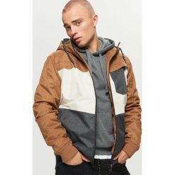 Kurtka z asymetryczną kieszenią - Żółty. Kurtki marki B'TWIN. W wyprzedaży za 179.99 zł.