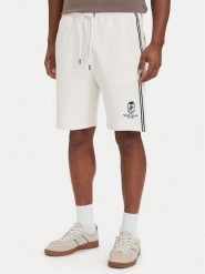 Tommy Hilfiger Szorty sportowe Crest Embroidery MW0MW42878 Beżowy jasny Relaxed Fit. Brązowe krótkie spodenki sportowe Tommy Hilfiger, l, bez wzorów, z bawełny. Za 489.99 zł.