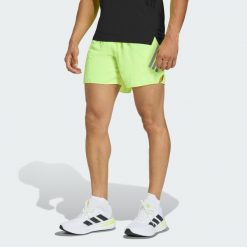 Szorty adi365 FORMOTION. Żółte szorty Adidas, bez wzorów, klasyczne, z standardowym stanem. Za 242.00 zł.