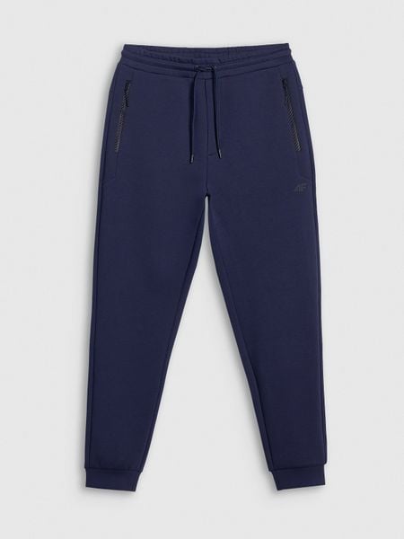 4F Spodnie dresowe joggery męskie - granatowe S. Niebieskie joggery i bojówki 4F, m, bez wzorów, z dresówki, sportowe. Za 189.99 zł.