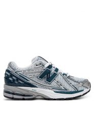 New Balance Sneakersy U1906RCE Srebrny. Szare buty sportowe casual New Balance, bez wzorów, ze skóry, bez zapięcia. Za 559.99 zł.
