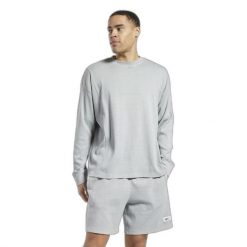 Bluza z dekoltem w kolorze naturalnym Reebok Classics. Szare bluzy Reebok, s, bez wzorów, bez kaptura. W wyprzedaży za 226.20 zł.