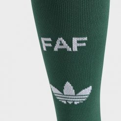 Getry wyjazdowe Algieria 26. Zielone legginsy długie sportowe Adidas, bez wzorów, do piłki nożnej. Za 79.95 zł.