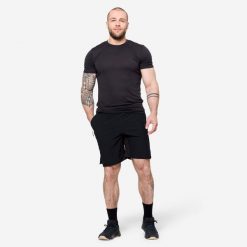 Koszulka fitness męska Domyos slim krótki rękaw. Czarne bluzki z długim rękawem DOMYOS, l, bez wzorów, z materiału, bez kołnierzyka, bez ramiączek. W wyprzedaży za 39.99 zł.