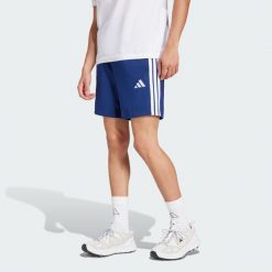 Szorty Essentials 3-Stripes Single Jersey 7-Inch. Białe szorty Adidas, m, bez wzorów, z jersey, sportowe. Za 149.00 zł.