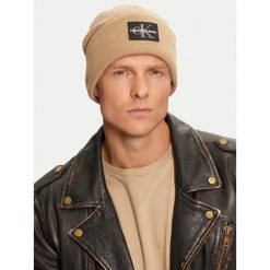 Czapka Calvin Klein. Brązowe czapki zimowe CALVIN KLEIN, bez wzorów. Za 229.99 zł.