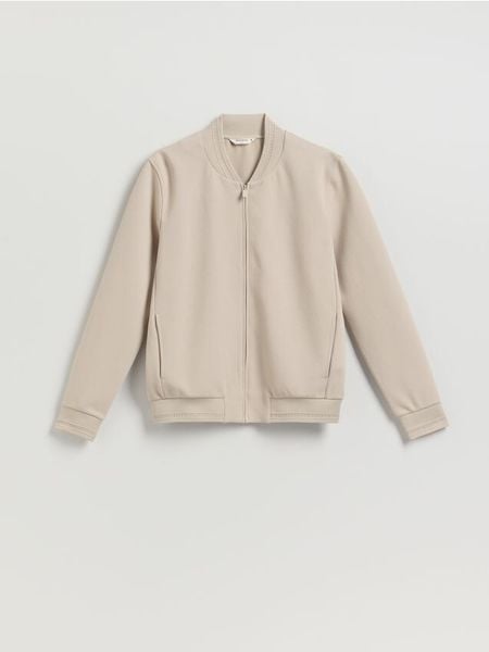 Bluza bomberka - beżowy. Brązowe kurtki Reserved, l, bez wzorów, z bawełny, bez kaptura. Za 119.99 zł.