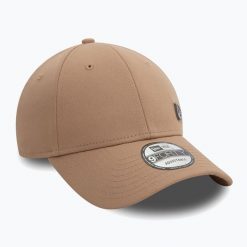 Czapka z daszkiem New Era Ne Pin 940. Brązowe czapki z daszkiem New Era, bez wzorów. Za 119.99 zł.
