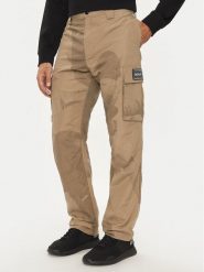 Boss Spodnie materiałowe Sapp NFL 50525922 Beżowy Relaxed Fit. Brązowe spodnie materiałowe Boss, m, bez wzorów, z materiału. Za 529.99 zł.