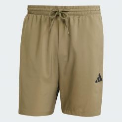 Szorty Essentials 3-Stripes Chelsea. Czarne krótkie spodenki sportowe Adidas, s, bez wzorów, z materiału. Za 110.99 zł.