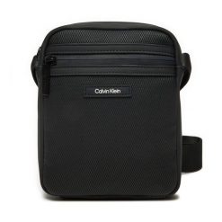 Saszetka Calvin Klein. Czarne saszetki i nerki CALVIN KLEIN, bez wzorów. Za 239.99 zł.