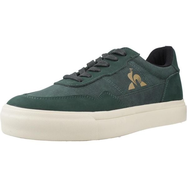 Buty LE COQ SPORTIF JET STAR_2 Zielony. Zielone buty trekkingowe le coq sportif, bez wzorów, ze skóry, bez zapięcia. Za 215.99 zł.