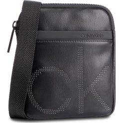 Saszetka CALVIN KLEIN - Ck Up Mini Flat Crossover K50K504353 001. Saszetki i nerki marki CALVIN KLEIN. Za 299.00 zł.