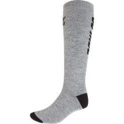 Skarpety narciarskie męskie SOMN351z - jasny szary melanż. Skarpety marki ARTENGO. Za 34.99 zł.