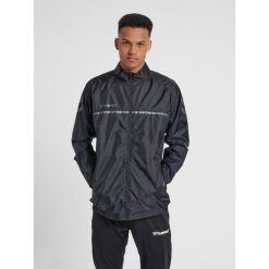 Kurtka Hummel hmlAUTHENTIC Pro. Brązowe kurtki Hummel, na jesień, m, bez wzorów, bez kaptura. W wyprzedaży za 267.00 zł.