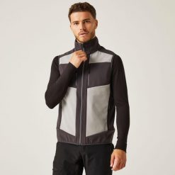 Kamizelka robocza softshellowa unisex E-Volve. Niebieskie kurtki softshell Regatta, m, bez wzorów, z softshellu, bez kaptura. W wyprzedaży za 309.99 zł.
