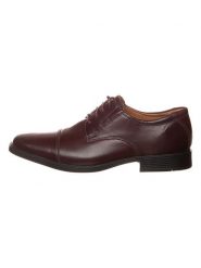 Clarks Skórzane trzewiki "Tilden Cap" w kolorze ciemnobrązowym rozmiar: 42. Brązowe botki sznurowane Clarks, bez wzorów, bez obcasa, bez zapięcia. Za 151.17 zł.