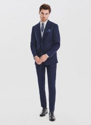 PAKO LORENTE - Granatowy garnitur męski z wełną. Niebieskie garnitury Pako Lorente, do pracy, m, bez wzorów, z poliesteru. Za 1,739.98 zł.