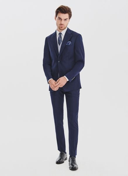 PAKO LORENTE - Granatowy garnitur męski z wełną. Niebieskie garnitury Pako Lorente, do pracy, m, bez wzorów, z poliesteru. Za 1,739.98 zł.