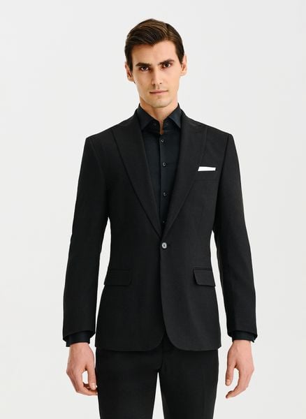 PAKO LORENTE – Czarna marynarka garniturowa. Czarne garnitury Pako Lorente, m, bez wzorów, z elastanu, młodzieżowe. Za 499.99 zł.