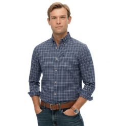 Koszula Superdry. Niebieskie koszule Superdry, l, bez wzorów, bez kołnierzyka, bez ramiączek. Za 330.25 zł.