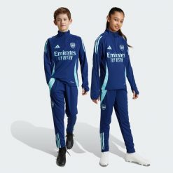Spodnie Arsenal Tiro 24 Training. Niebieskie spodnie treningowe długie Adidas, s, bez wzorów, z dresówki. Za 299.00 zł.