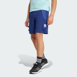 Szorty Arsenal Seasonal Cargo. Niebieskie szorty Adidas, l, bez wzorów, z materiału, sportowe. Za 279.00 zł.