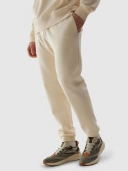 4F Spodnie dresowe w kolorze kremowym rozmiar: M. Brązowe spodnie treningowe długie 4F, m, bez wzorów, z dresówki. Za 104.64 zł.