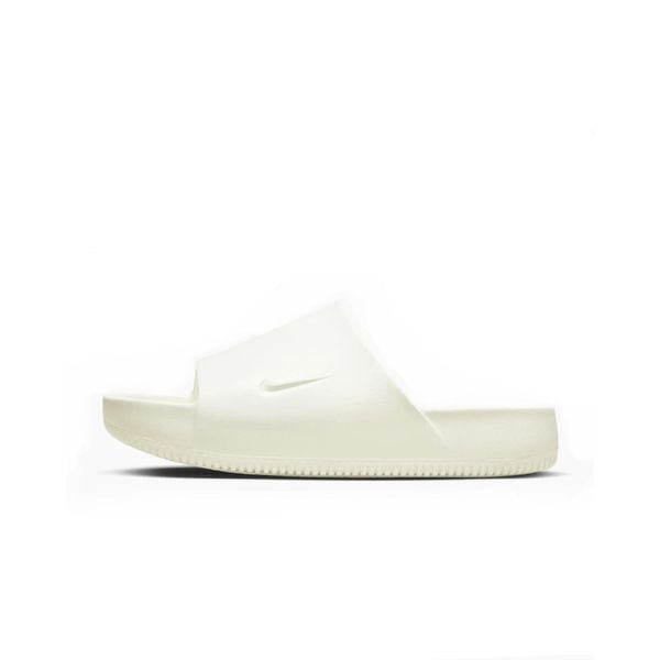 Klapki męskie Nike Calm Slide. Brązowe klapki Nike, z materiału. Za 398.00 zł.