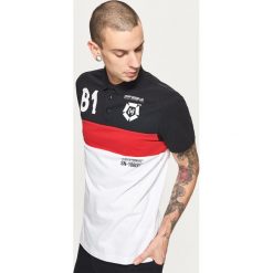 Koszulka polo z nadrukiem - Czerwony. Koszulki polo sportowe marki Cropp. W wyprzedaży za 39.99 zł.