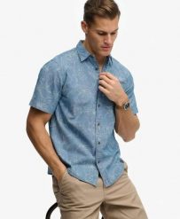 Superdry Koszula Vintage Loom krótki rękaw z organicznej bawełny. Niebieskie koszule Superdry, xl, bez wzorów, z bawełny, bez kołnierzyka, bez ramiączek. Za 301.95 zł.