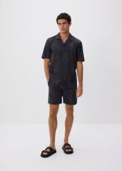 Bawełniana koszula regular fit - ciemnoszary. Szare koszule Reserved, l, bez wzorów, z bawełny, bez kołnierzyka, bez ramiączek. Za 129.99 zł.