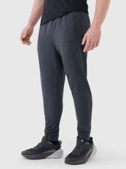 4F Spodnie dresowe w kolorze antracytowym rozmiar: S. Czarne spodnie treningowe długie 4F, s, bez wzorów, z dresówki. Za 74.63 zł.