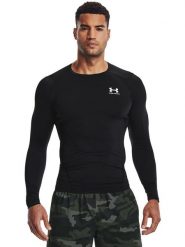 Under Armour Koszulka funkcyjna "Comp" w kolorze czarnym rozmiar: L. Czarne t-shirty sportowe Under Armour, bez wzorów, z materiału, bez ramiączek, outdoorowe. Za 97.28 zł.