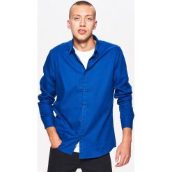 Gładka koszula slim fit - Turkusowy. Koszule marki Cropp. Za 69.99 zł.