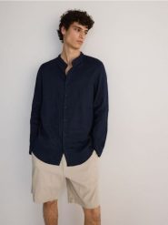 Lniana koszula regular fit - granatowy. Niebieskie koszule Reserved, l, bez wzorów, bez kołnierzyka, bez ramiączek. Za 179.99 zł.