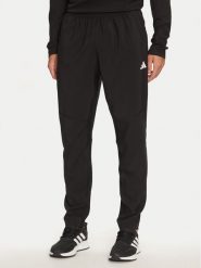 Adidas Spodnie dresowe Own The Run IK5024 Czarny Regular Fit. Czarne spodnie treningowe długie Adidas, m, bez wzorów, z dresówki. Za 199.99 zł.
