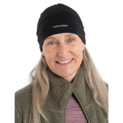 Czapka Zimowa Unisex Icebreaker Mer 200 Oasis Beanie. Czarne czapki zimowe Icebreaker, bez wzorów, z wełny. Za 116.19 zł.