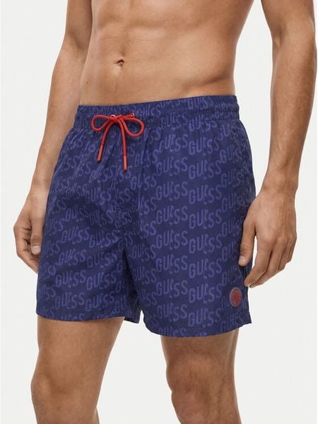 Guess Szorty kąpielowe F6GT12 WG2A2 Niebieski Regular Fit. Niebieskie kąpielówki Guess, m, z aplikacjami, z syntetyku. Za 299.99 zł.