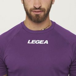 Koszulka Legea Leipzig Dorosłych. Fioletowe t-shirty sportowe Legea, bez wzorów, bez ramiączek, na fitness i siłownię. Za 70.00 zł.